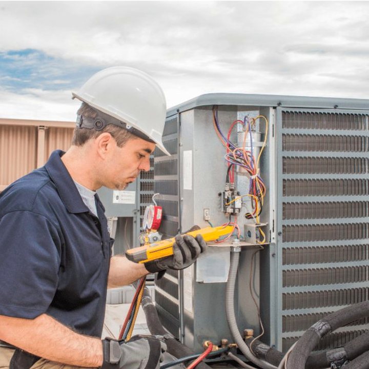 Thornbury Heating & Cooling HVAC technician on a service call in Thornbury, Ontario